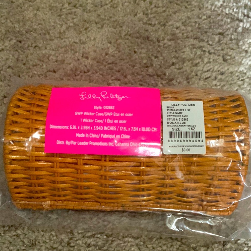 It’s a pretty sun glass case , could fit a few accessories .New never opened